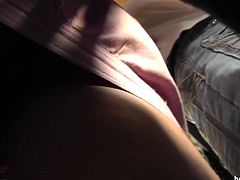 Naughty babe gets filmed by horny voyeur under her sexy skirt having her panties revealed