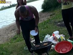 After an intensive drill in missionary style and mouth fucking a stiff rod, curvy brunette slut and horny black fucker continue partying during the picnic.