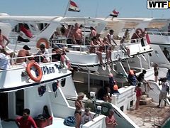 Salty looking Russian bitches having great time on the yacht. They take sunbath wearing tiny seductive bikini and stroke each other with rapacious hands in steamy sex video by WTF Pass.