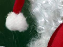 Arousing blonde Kitty Cat with nice hooters and sexy body in fishnet stockings and high heels gives head to horny Santa and gets his cock deep in shaved cunny in doggy style position