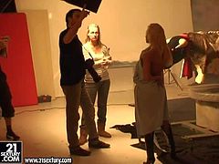 Stunning young blonde bombshell Sandy with perfectly shaped boobs and jaw dropping hooters in red thong and leather boots has fun while riding mechanical bull at memorable photo shoot