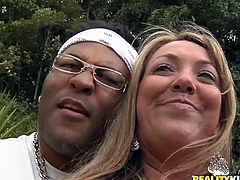 Rapacious black daddy is having a steamy date outdoors with a flamboyant white milf. They stop by the waterfalls where she stands in doggy style to rub her cunt with fingers in steamy interracial sex video by Reaity Kings.