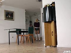 Tracy is adorable blonde babe wearing college uniform. She is looking extremely seductive and hot in the outfit. Tracy Gold lifts her skirts up flashing her pussy and playing with it actively.