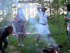 College drunks go out for a party in the woods and turn it into an orgy of sex with lots of sucking and pussy pounding going on in a hot sex party.