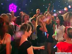 Join this crazy party which is full of slutty hoes. Sexy girls are dancing on a dance floor having fun. One of the girls kneels down taking massive dick in her mouth right on dance floor.