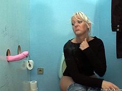 Nasty bitch Lili takes pink dildo and pokes her twat in a public toilet. Then she blows hard dick through the hole in a wall.