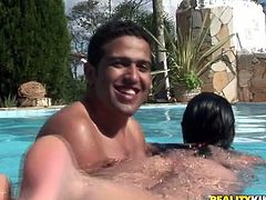 Well stacked Latin hot pants swims in a pool with a sex greedy dude wearing tiny bikini before they get out where he oral strokes her oversized baggy tits and kisses juicy cellulite ass.
