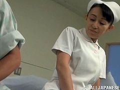 Skinny Japanese nurse shakes her ass for a patient and then gets her tight pussy fucked hard from behind.