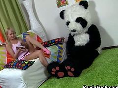 This young blonde teen was bored till her Panda came alive and gave her a hard monster strap-on to play with and fuck in this free tube video.
