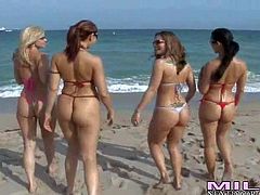 Kristen Cameron, Selena, Brianna Ray, Satin and Kaitlyn are perfect bodied bikini-clad milfs with bubble asses. They show off their sexy butts at the play volleyball at the beach. They are seductively beautiful in their tiny bikinis.