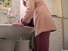 This slim blondie in short gown has already brushed her teeth. But spoiled nympho can't fall asleep till she's fed with delicious cum. So kinky gal kneels down and gives a solid blowjob right in the bathroom.