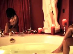 Mesmerizing Indian babe gets into a luxurious oversized hot tub lighted with aromatic candles. There she rubs her cuddly body insatiably in peppering solo sex video by Indian Sex Lounge.