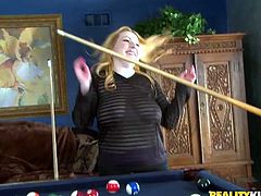 Fluffy blonde bitch with massive ass lost her pool game and has to please the winner with awesome blowjob. She also titfucks that big juicy prick.