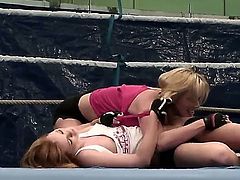 Two aroused blonde pornstars Nikita and Tanya Tate enjoy in revealing each others naked body as they wrestle in the gym in the ring and play with each others pussy