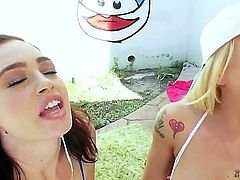 Slutty blonde and brunette babes Jodi Taylor and Leya Falcon with natural boobies get down on knees and give awesome deep throat to randy dude in backyard in point of view.