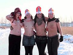 Watch as these four lovely and naughty girls take it to the extreme as they decided to go out and show off their boobies while ice skating and eventually strip down their pants to display their pussy.