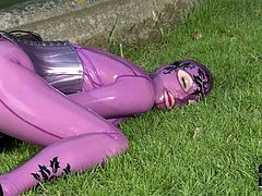 Latex Lucy is wearing pink latex and spreads her pussy with her favorite dildo outdoors! She enjoys every inch of it and sticks it deep!