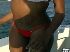 Delyla is a dark skinned ebony hottie in sexy bikini. She show off her perfect bubble ass on a boat without stripping. White dude loves her perfectly shaped brown ass.