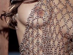 Steel fishnet dress of fabulous busty brunette Sunny Leone is hot looking. She takes it off and wants to masturbate on cam!