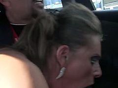 Sexy Susi loves to give a blowjob to Steve Holmes inside the car while the people are passing around them