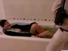 Two wicked MILF chicks take hot bath fully clothed. I don't know what will turn you on, their wet clothes or their stupid faces.