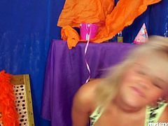 Flirty blond cutie strips in front of cam like a professional stripper before she lies to rub her aroused vagina with fingers in peppering sex clip by My Sexy Kittens.