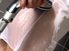 Mesmerizing Japanese babe rubs her cuddly body in shower. She strokes her full tits and stimulates her beaver with a hard water stream in steamy solo sex scene by Jav HD.