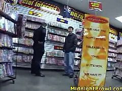 Sex hungry white dude hooks up with a tasty looking Asian slut with petite frame covered with white mini dress in disk store to lure her to steamy fuck.