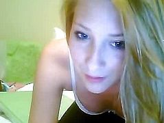 Blonde in a striped blouse sitting in front of webcam - 4