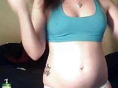 Pregnant woman in blue tank top
