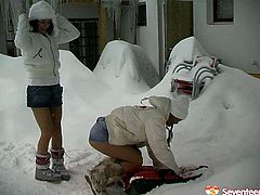Sexy bitches play with snow before having lesbian sex outdoor