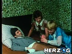 In this retro German porn watch all the nasty deeds and dirty sex, that goes on at this hotel. After breakfast, a businessman gets jacked off by his wife, while the maid watches. He fucks wet pussy and one by one, more ladies enter his room.