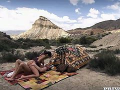 Brunette slut has wild sex at a picnic in the mountains. She sucks a dick standing on her knees. After that she rides a dick and gives a titjob.