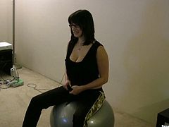 Playful amateur Shelly is sitting on a gym ball wearing tempting black lingerie. She shows off her curves taking teasing positions.