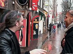 This red-haired trollop knows her job well that's for sure! She pulls down his pants and takes his dick in her slutty mouth. She sucks it greedily giving him a great blojwob.