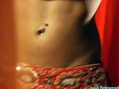 Petite Lady from bollywood dancing and stripping her clothes off slowly by teasing you with her every step.You will love her sexy body and her lovely brown tits.