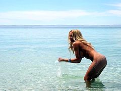 Go to the beach and die there because if you see Jennifer Vaughn getting naked this joyfully you will want to do unspeakable things, probably illegal too, with her.