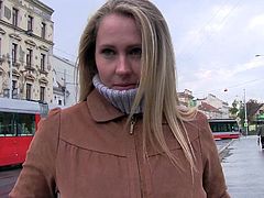 I saw this slut walking down the street and had to approach her because she looked so good. I convinced her to lift up her sweater so I could see her perfect boobs. She unbuttoned my pants and pulled my cock out to suck it.