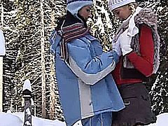 Pigtailed blonde young babe with big knockers Yvone getting slick snatch fucked with a dildo by a lesbian outdoors in the snow