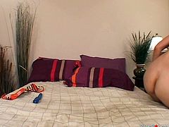 Horny brunette has a maggot in her head and ususally goes nuts when she's alone at home. Slutty girlie with natural tits has a dildo, which is surely perfect for a proper drilling of her wet pussy right on the wide bed.