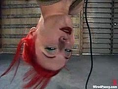 Redhead bitch Sabrina Sparx gets her cunt toyed in a basement