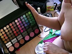 Rene appears naked on screen exposing her big boobs. She starts applying cosmetics on her face still sitting naked in front of camera.