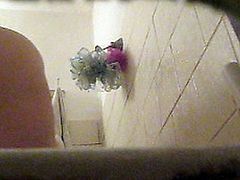 vife in the bathroom