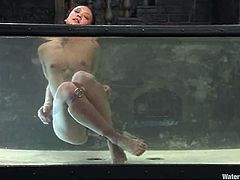 This kinky and juicy Asian lust Jandi Lin is being tortured so fucking hard! Honey gets nailed on the bars with ropes and then hit with a spray of water.