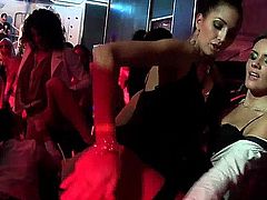 Naughty lesbians dancing lasciviously and fucking giant cocks in a club sex party