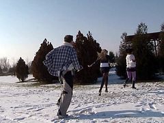 Two playful chics hook up with a horny dad outdoor. First they play snowballs before he lies with pants pulled down to welcome double blowjob from them in threesome sex video by Fame Digital.