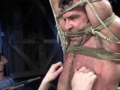 A guy called Totaleurosex is having fun with Claire Adams in a basement. He lets the dominatrix tie him up and then enjoys being tormented and humiliated.