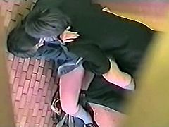Nothing beats some really hot and kinky Asian sex and this naughty schoolgirl gets caught on spycam sitting on the stairs with her lovers hand up her skirt and his fingers in her slit.