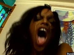 Black like coal babe stands on her knees and tries to get a portion of sticky juice. At the end of sucking session she gets cum on her lustful face.