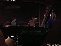 Slutty blond haired girlie with natural tits wears light pink dress. This long legged nympho sits between two men on the back seat of the limo and rubs her wet pussy madly for orgasm.